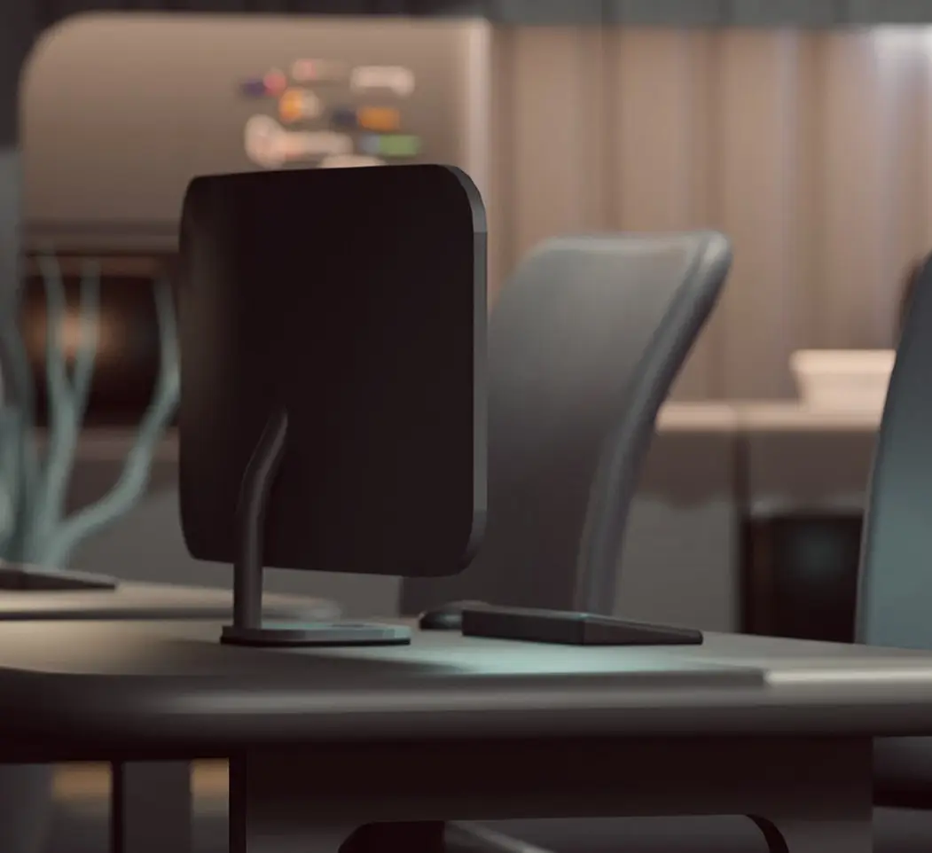 Dark 3D render of a monitor on a desk in a moody office