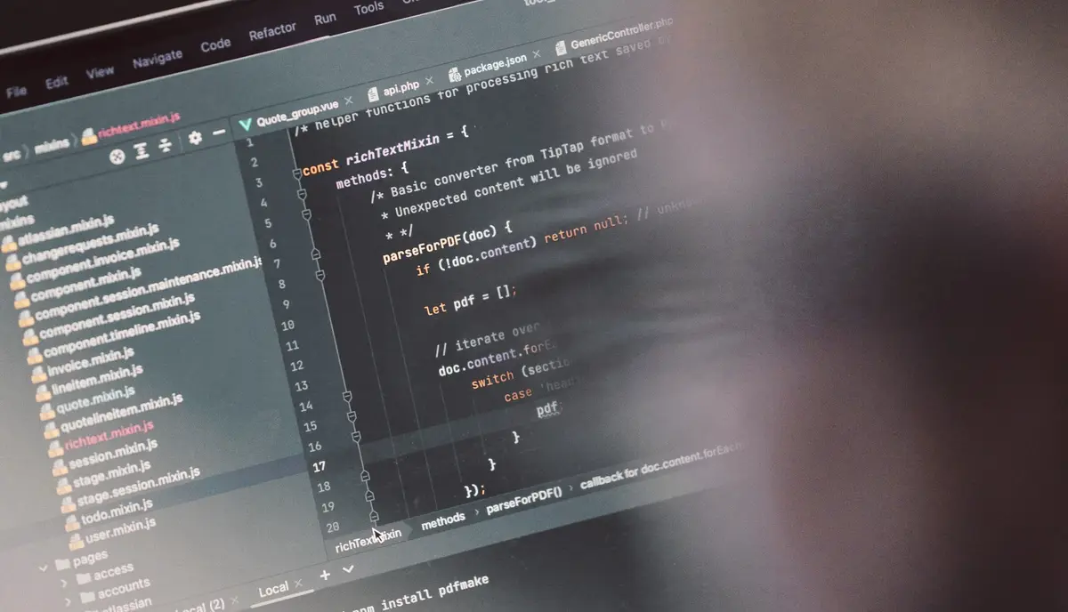 Code editor on a screen showing a JavaScript rich text mixin and project files