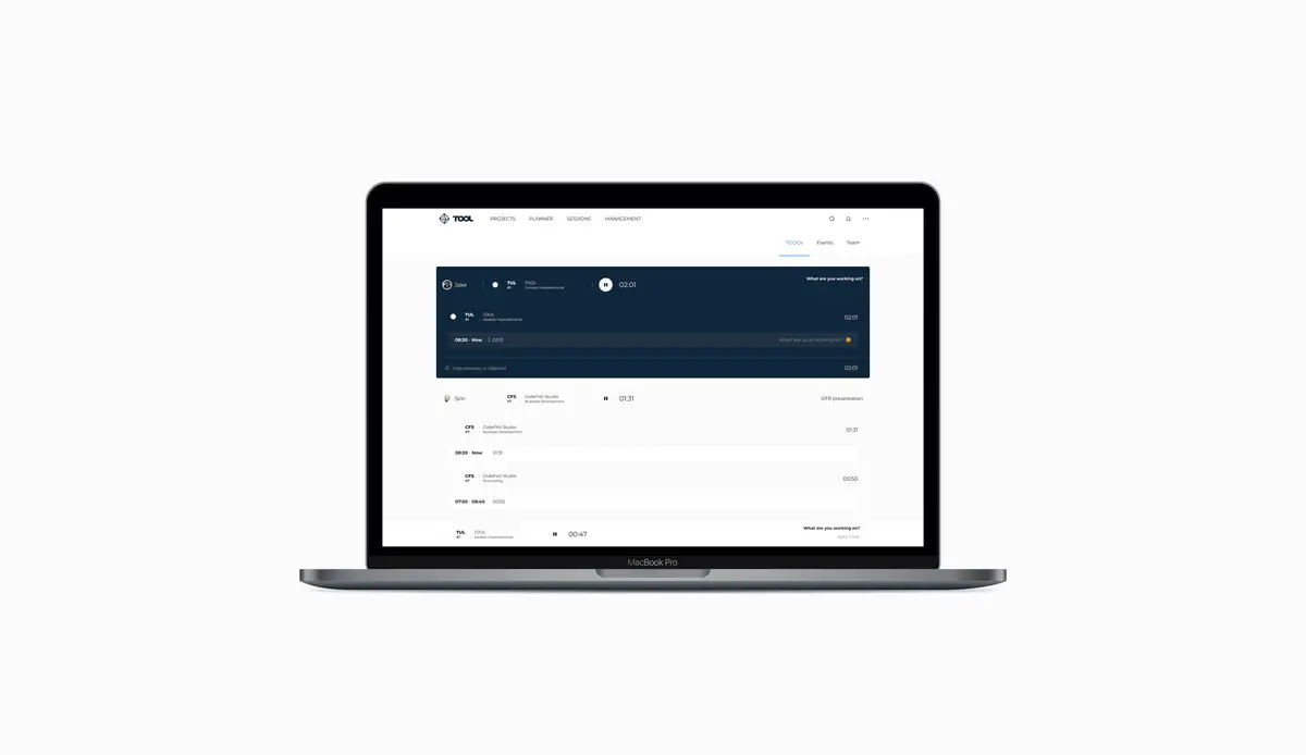 Laptop displaying a web app dashboard with a dark navy header panel