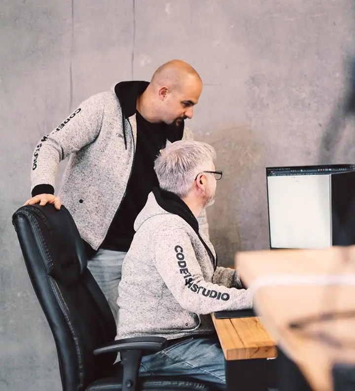 CodeFish Studio team members in a workshop