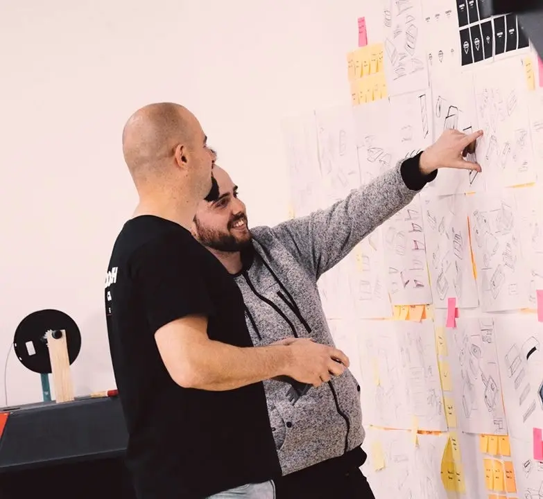 CodeFish Studio team members in a workshop