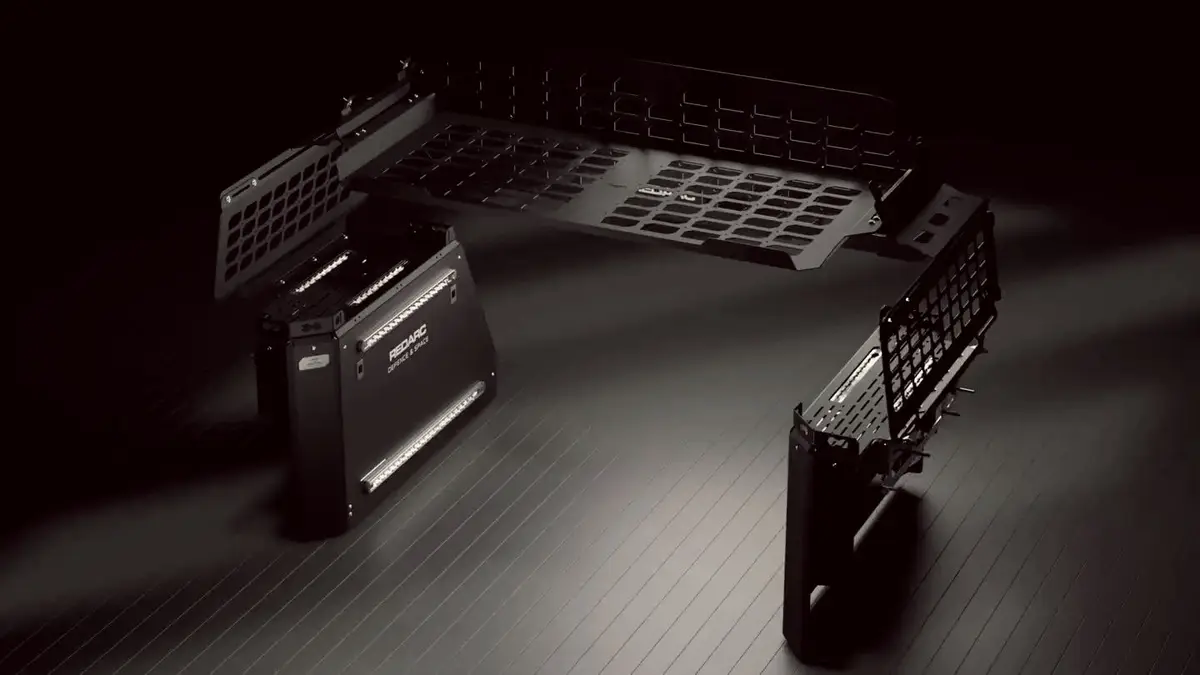 Rendered REDARC Defence and Space modular vehicle storage system on a dark floor